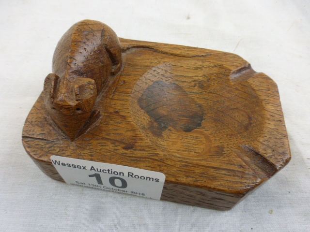 Robert 'Mouseman' Thompson of Kilburn: an oak ashtray of standard rectangular form with carved mouse