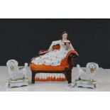 Staffordshire flatback type model of a female reclining on a Chaise lounge & a 19th century pair