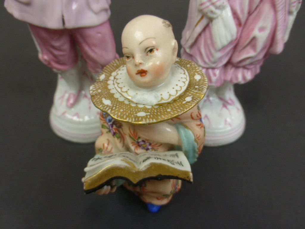 Novelty inkwell in the form of an oriental kneeling child with open book, the head forming the - Image 2 of 4