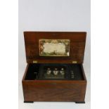 Vintage Wooden cased Music box with 8 Aires with the Bells having Butterfly strikers