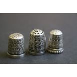 Three Silver Thimbles