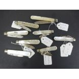 Eight vintage Hallmarked Silver & Mother of Pearl Fruit Knives to include; Sheffield 1901, 1924,