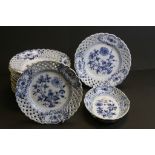 Collection of 14 blue & white plates with pierced lattice and painted Floral decoration, all with