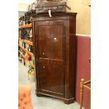 Early 19th century Mahogany Inlaid Corner Cloak Cupboard, the single panel door opening to reveal