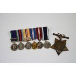 A Full Size Khedives Star Dated 1882 Together With A British Miniature Six Medal Group.