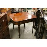 19th century Mahogany Fold-Over Tea Table with Single Drawer and raised on turned tapering legs,