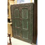 Middle Eastern / Indian Hardwood Cupboard, ornately carved with foliage and flowers, distressed