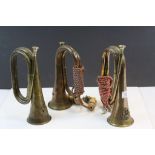 Three Military style Copper & Brass Bugles with applied Military Badges
