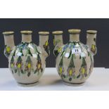 Two Persian Tulip vases with hand painted Floral decoration