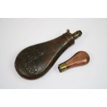 Two Copper Gun Powder Flasks One With Hunting Scene.