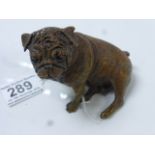 Reproduction cold painted figure of a pug dog, seated on hind legs, height approximately 8.5cm