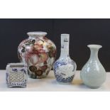 Four items of Oriental ceramics to include a blue & white vase with Dragon decoration and