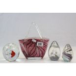 Three glass Paperweights and an Art glass Basket