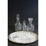 Three vintage cut glass Decanters to include one with Masonic engraving plus a Silver plate &