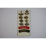A Collection Of Approx 12 x British Military Somerset Light Infantry Badges.