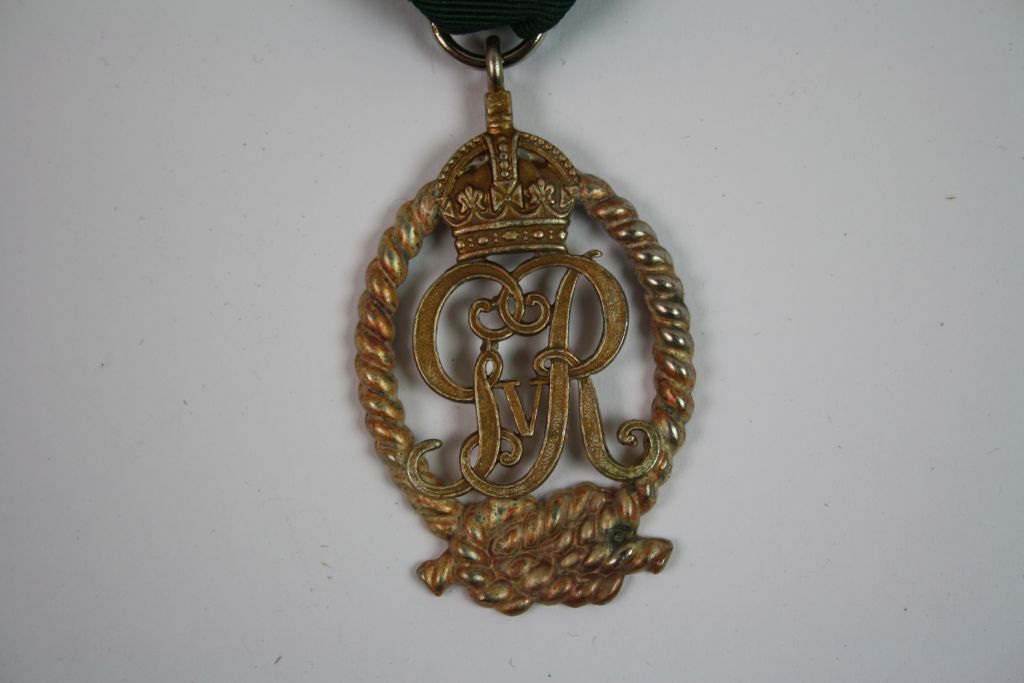 A Royal Navy Reserve Officers Decoration Medal, An Oval Silver Gilt Medal Formed By The Royal Cypher - Image 2 of 5