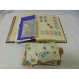 Stamp album of world stamps together with a small quantity of UK stamps, used and unused