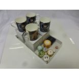 Four boxed Halycon Days mugs together with a boxed Halycon Days enamel lidded trinket pot and a