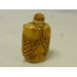 Bone snuff bottle in the form of two fishes