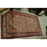Iranian Wool Red Ground Rug, 200cms x 113cms