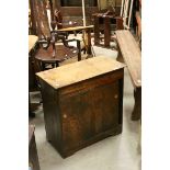 Mid 20th century Oak Sewing Cabinet with hinged lift lid top and sliding doors below