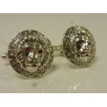 Pair of Silver Lion Mask Cufflinks set with Ruby Eyes