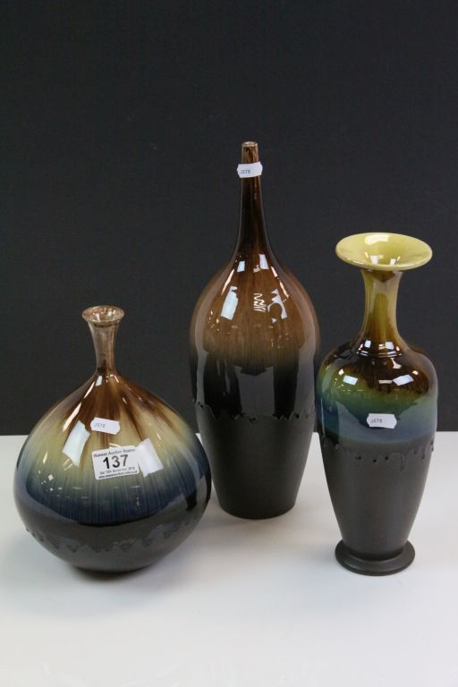 Three Persian drip glazed Vases in varying sizes