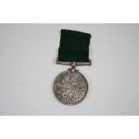 A Full Size Long Service Volunteer Force Medal Issued To : 1439 PTE G.H. CHAPMAN Of The 1st