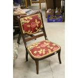 Early 20th century Mahogany Inlaid Nursing Chair on Sabre Legs