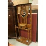 Early 20th century Art Nouveau Oak Hall Stand with Central Circular Mirror and Glove Compartment