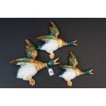 Graduating set of three Beswick ceramic wall plaques in the form of flying Ducks, numbers 596'0