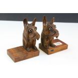 Pair of Wooden Carved Bookends in the form of Oswald Black Forest Scottie Dogs with Glass Eyes