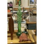 Terracotta model of a Tortoise, small glass Oil lamp and a large green Glass bottle in the form of a
