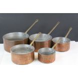 Set of Five Copper Graduating Saucepans with Brass Handles