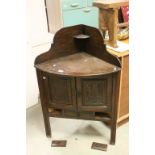 19th century Oak Corner Cabinet with Gallery Back above Two Carved Panel Doors and Three Small