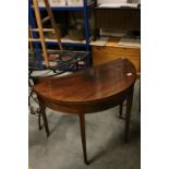 Early 19th century Mahogany String Inlaid Oval Fold-Over Card Table with Green Baize Interior and