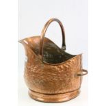 Vintage Copper Coal scuttle with swing handle and a beaten finish