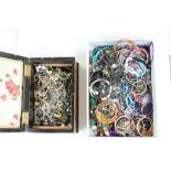 Two boxes of vintage costume jewellery to include bangles, necklaces, bracelets etc