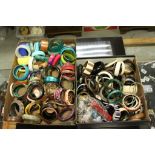 Large quantity of costume jewellery bangles (2 boxes)