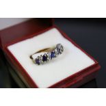 Gem set 9ct yellow gold and white gold set ring,alternate blue and white stones, ring size N