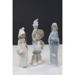 Three Lladro ceramic figurines to include a 1980 Olympic figure with Olympic Torch held aloft