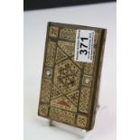 Indian wooden parquetry cigarette holder, stained geometric patterns to front, back and sides, holes