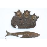 Cast metal decorative panel depicting three kittens, partial cold painted, approximately 12.5cm x