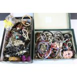 Two shoe boxes of costume jewellery to include bangles, bracelets and necklaces