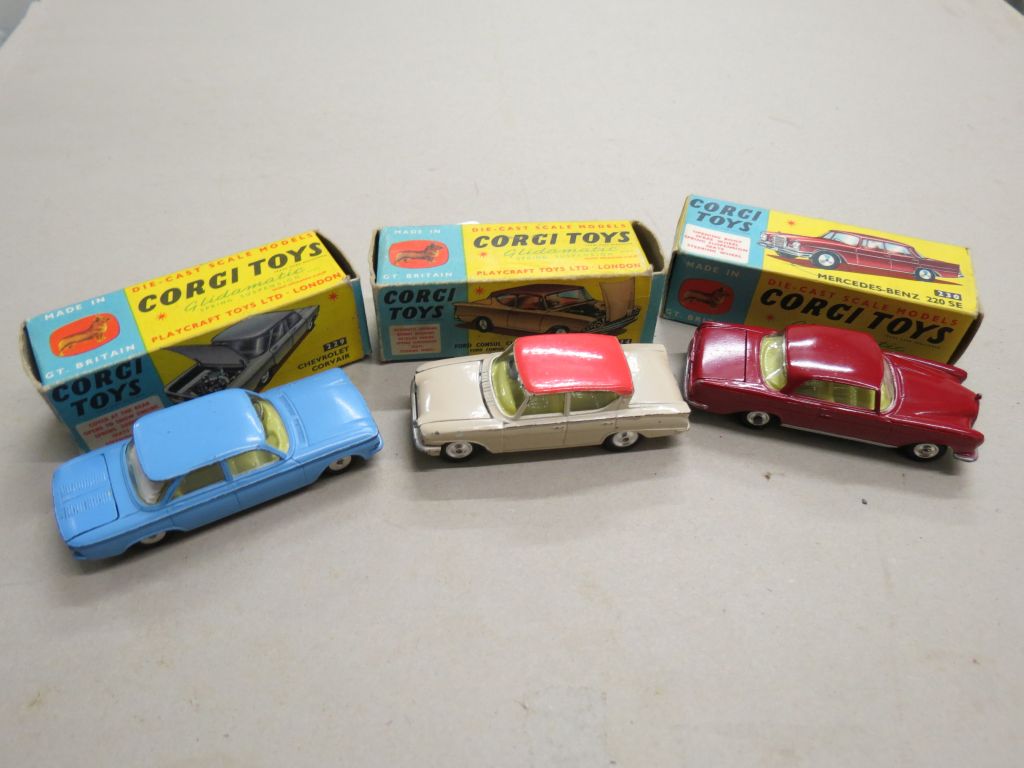 Three boxed Corgi diecast models to include 234 Ford Consul Classic 315 in beige with pink roof, 230