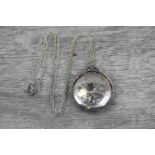 Victorian style silver swivel locket pendant necklace, engraved scroll decoration to the circular