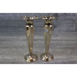 Pair of Walker & Hall silver trumpet vases, flared necks, fluted tapered stems, moulded loaded