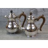 Mid 20th century silver teapot and coffee pot, baluster form with simple band decoration, wooden
