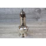 Silver sugar caster, scallop detailing to foot and body, triangular finial, makers Elkington & Co
