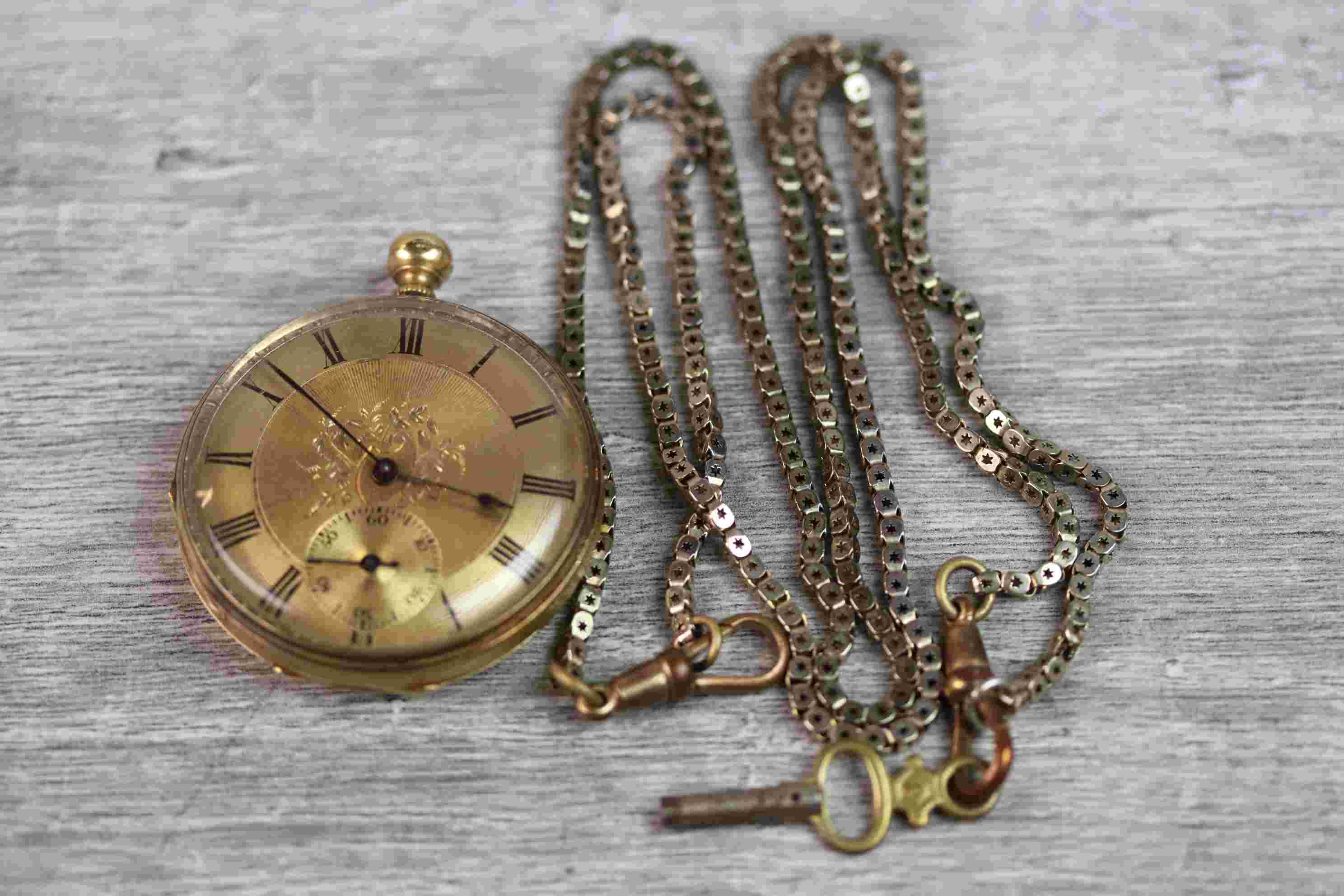 18ct yellow gold open faced key wind pocket watch, gilt engine turned dial and subsidiary dial,
